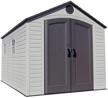 Plastic storage shed with internal shelving