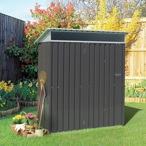 Dark gray metal garden shed with window