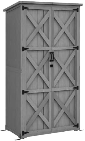 Vertical gray wooden shed with asphalt roof