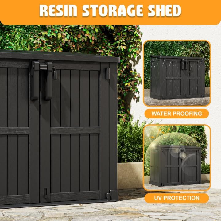Black resin storage shed with floor panel — photo 3