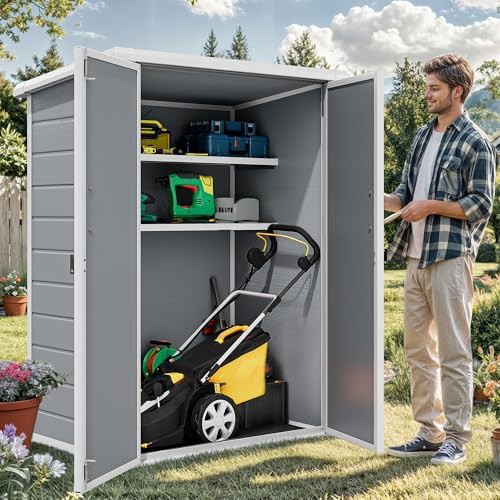 Vertical plastic storage shed with internal shelves — photo 3