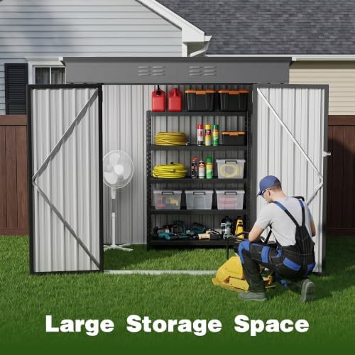 Gray metal garden tool shed with sloped roof — photo 4