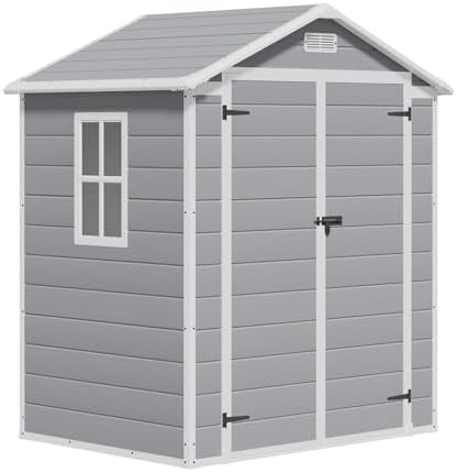 Compact gray resin shed with floor