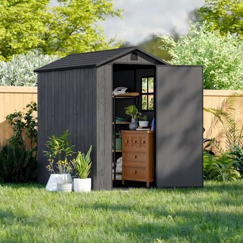 Dark gray resin shed with floor base — photo 3