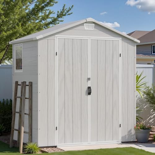 Light grey resin lawn mower shed