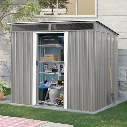 Metal storage shed with sliding doors and transparent panels